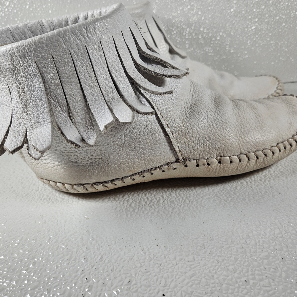 Taos vintage white leather moccasins.